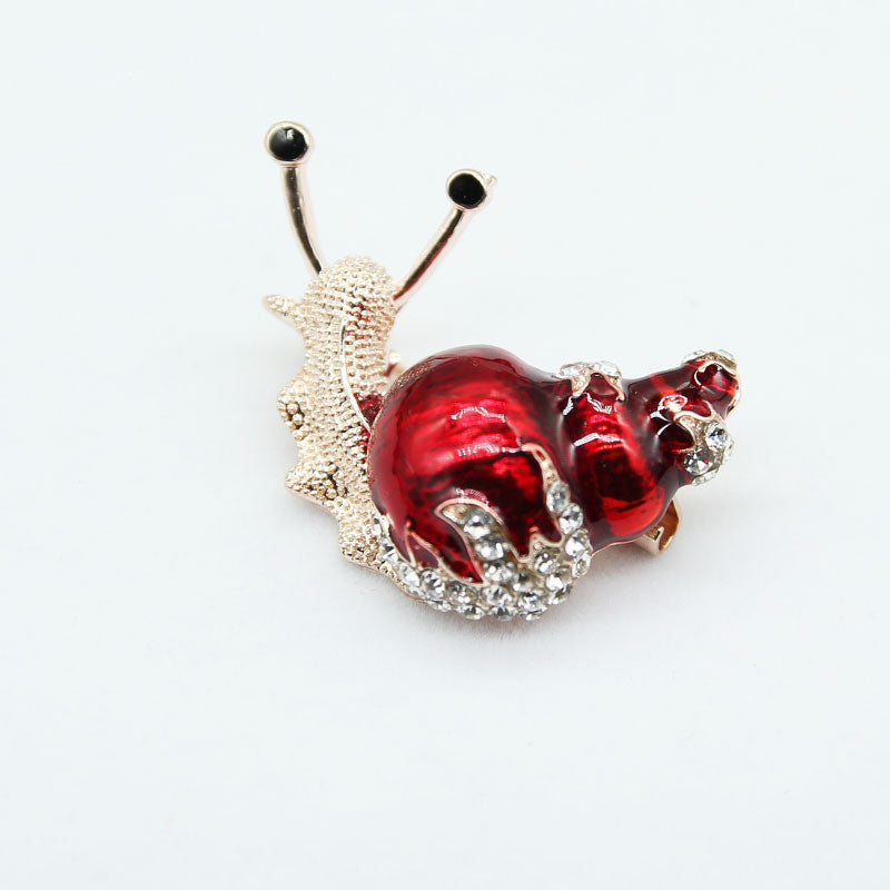 Enamel snail brooch