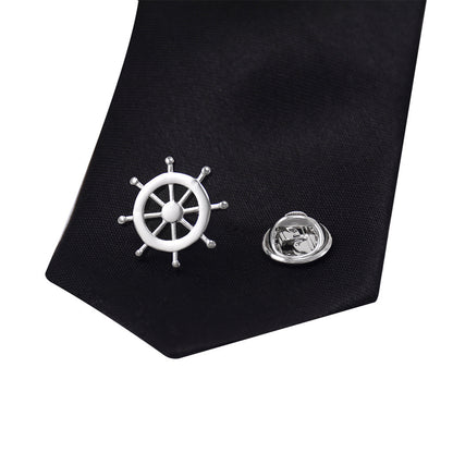 Silver rudder brooch