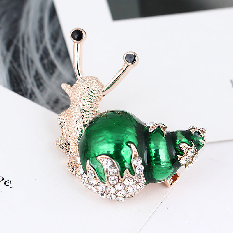 Enamel snail brooch
