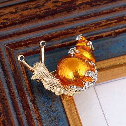 Enamel snail brooch