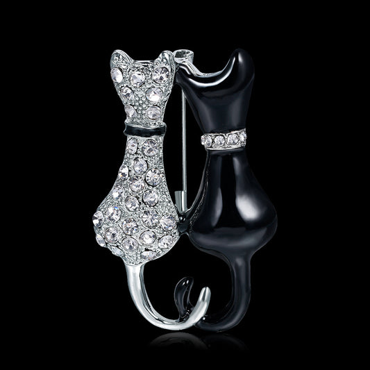 Fashion Black And White Paint Diamond Double Fox Brooch