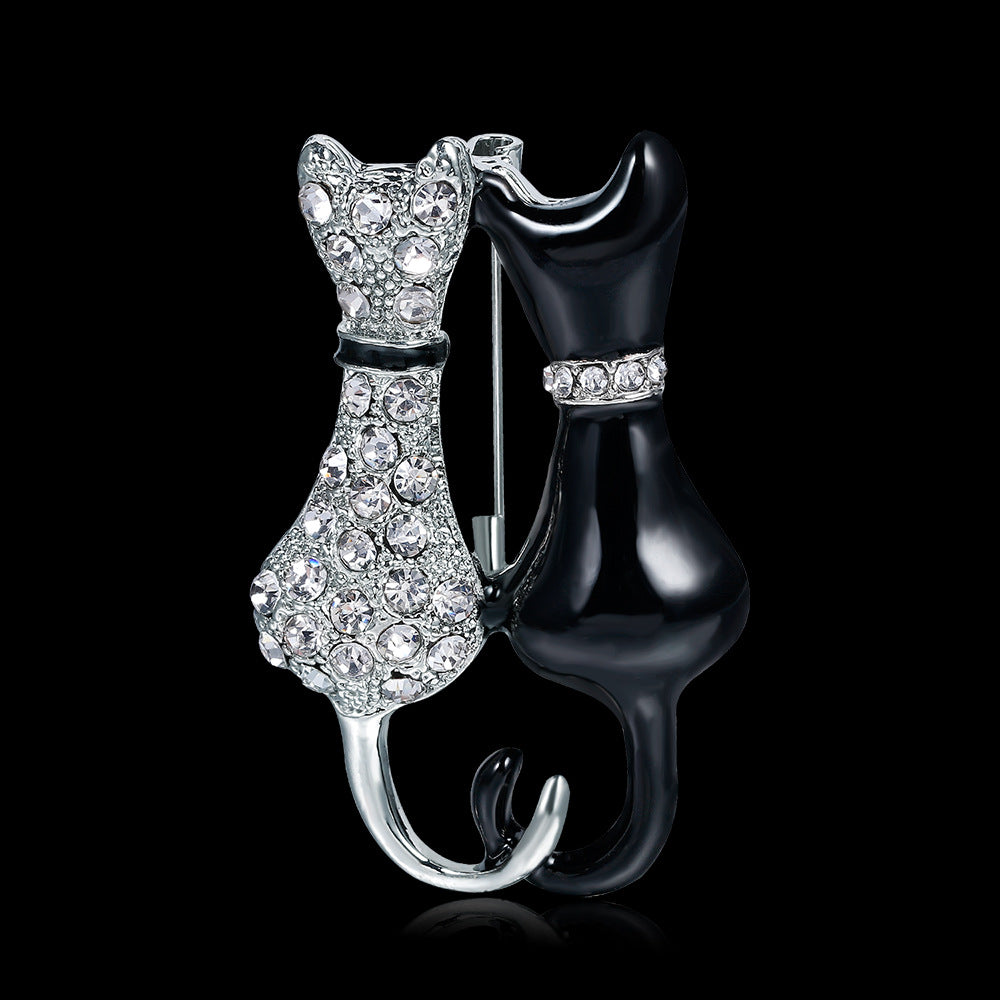 Fashion Black And White Paint Diamond Double Fox Brooch