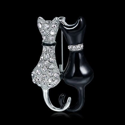 Fashion Black And White Paint Diamond Double Fox Brooch