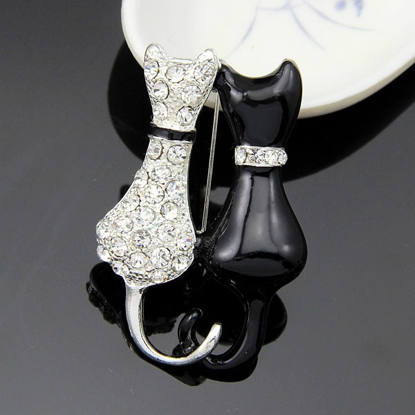 Fashion Black And White Paint Diamond Double Fox Brooch