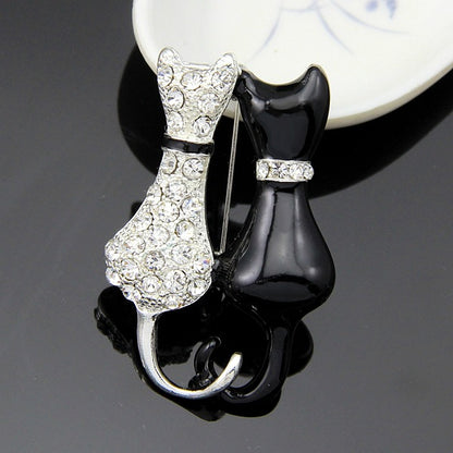 Fashion Black And White Paint Diamond Double Fox Brooch