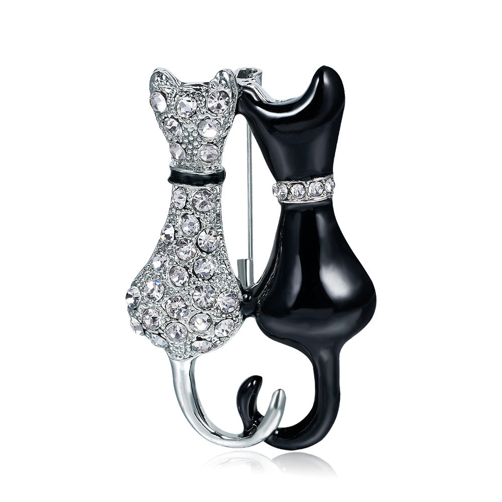 Fashion Black And White Paint Diamond Double Fox Brooch