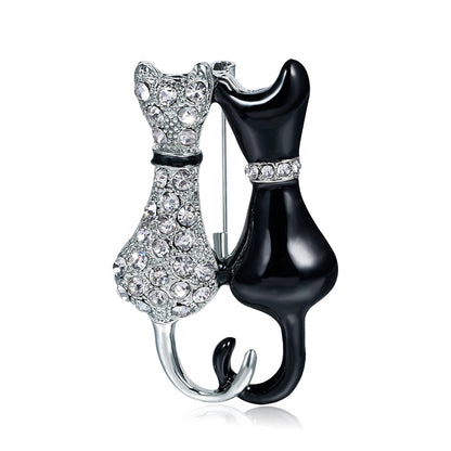Fashion Black And White Paint Diamond Double Fox Brooch