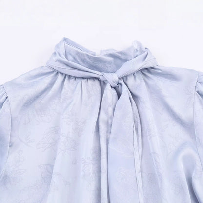 Sleek Jacquard Silk-textured Blouse With A Bow Detail