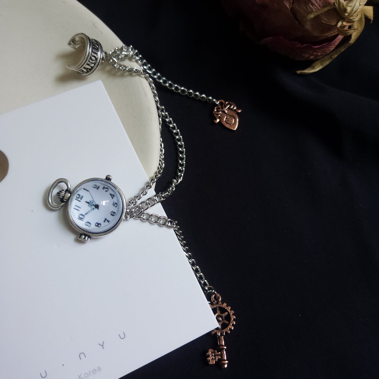 Watch key ear bone clip integrated earrings