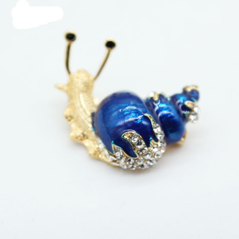 Enamel snail brooch