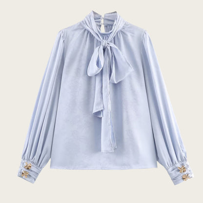 Sleek Jacquard Silk-textured Blouse With A Bow Detail
