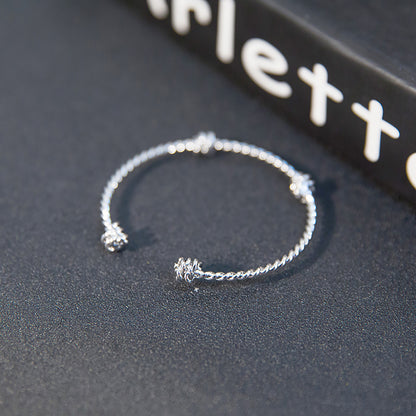 Three knotted opening bracelets