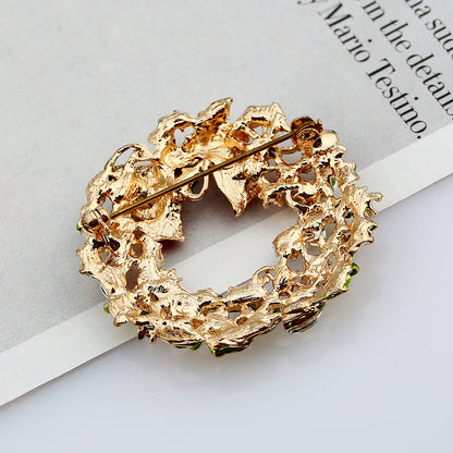 Bow tie wreath brooch