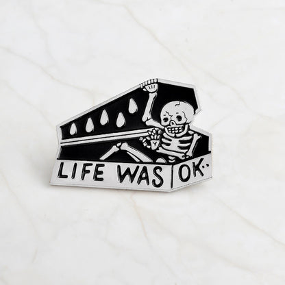 Skull head brooch
