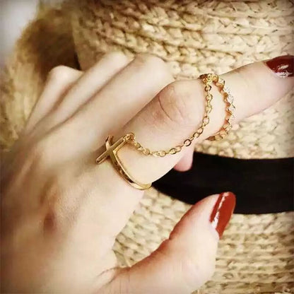 Cross chain ring
