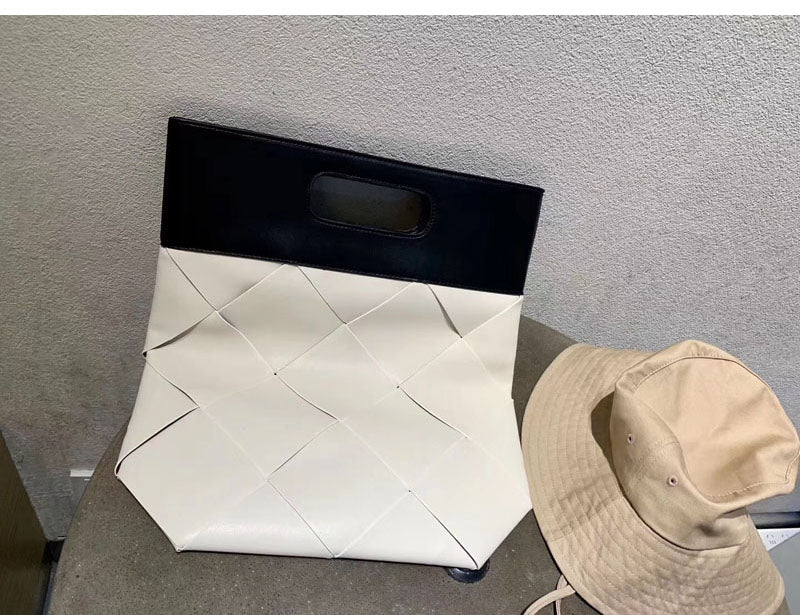 Embossed woven handbag folding clutch